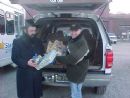 Fred Landay & Rabbi Vogel prepare toys for children of inmates - Chanukah 5766 - 2006