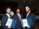 Aleph volunteer, Rabbi Zalman Friedman receiving an award from the Warden in the federal prison in Ft. Dix NJ (4/25/2007)