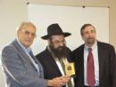 Mr. D. and Mr. S. Robinson with Rabbi Vogel