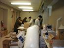volunteers pack matzohs - Passover 5769