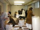 volunteers pack matzohs - Passover 5769