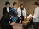 Rabbi Vogel oversees the packing of food to the inmates for Rosh Hashana 5770